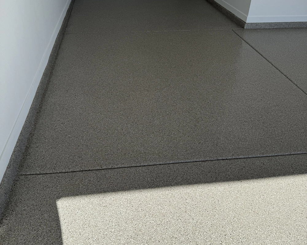 Floor Kings team coating a garage floor in Lake Havasu Arizona